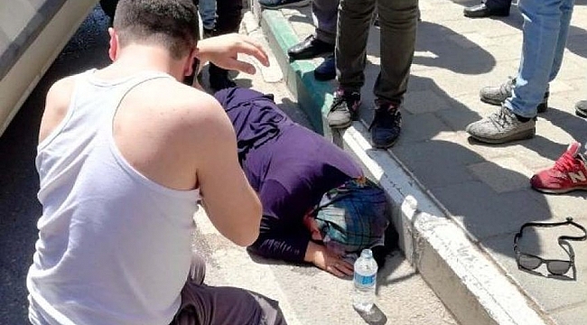 Araçtan inip çarptığı kadına su içirdi