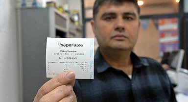 Rekor ikramiye talihlisi çekini aldı