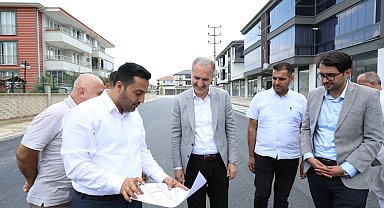 Ertuğrulgazi Mahallesinde tretuvar ve yol kaplama çalışmaları sürüyor