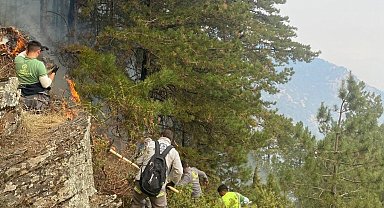 Alevlerin gölgesinde dinlenen kahramanlar