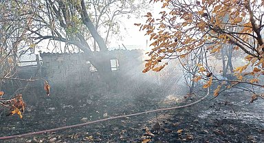 Bahçede çıkan yangın ağaçlık alana sıçramadan söndürüldü