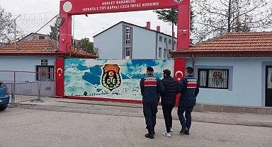 Isparta'da 11 yıl hapis cezasıyla aranan zehir taciri yakalandı