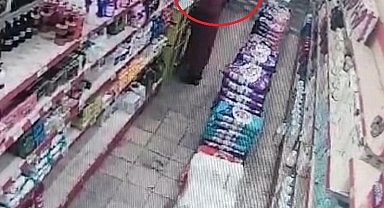 Temizlik malzemesi çalan kadın kameraya yansıdı