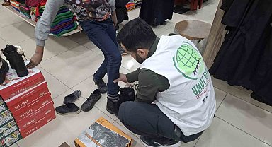 Van'da ihtiyaç sahibi çocuklara bot ve mont yardımı