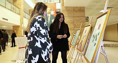 Yükümlülerin yaptığı ebru ve resimler göz doldurdu