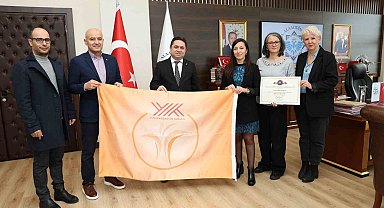 ALKÜ'de turuncu bayrak gururu