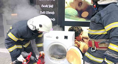 Masaj salonunda kurutma makinesi alev aldı