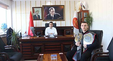 Kickboksçu WMAOC Şampiyon Turgut'u makamında ağırladı