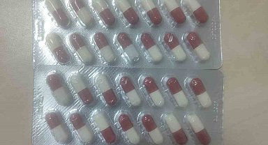 Manisa'da polisten kaçan şüpheliden uyuşturucu hap çıktı