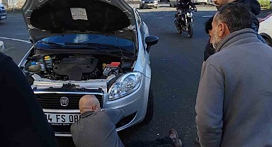 Motora sıkışan kedi kurtarıldı