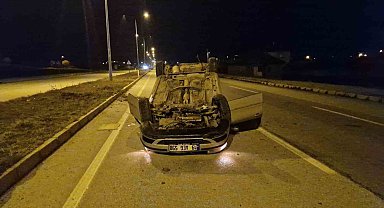 Ters dönen otomobilden yara almadan çıktı