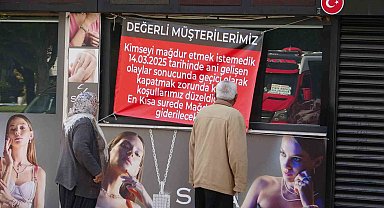 120 milyon lira vurgun yaptığı iddia edilen kuyumcu afişle mesaj verdi