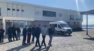 Ayvalık'ta Sahil Güvenlik ekipleri göçmen kaçakçılarını kıskıvrak yakaladı