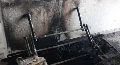Sobadan çıkan yangın evde zarara neden oldu