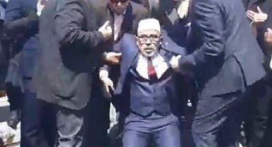 Başbuğ Türkeş'i anma programında dua eden imam bayıldı