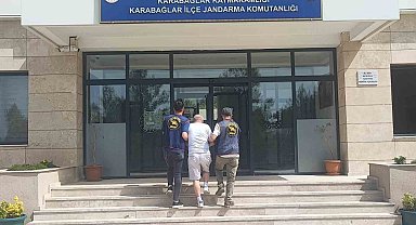 18 ayrı suçtan aranan firari şahsı jandarma dedektifleri İzmir'de yakaladı