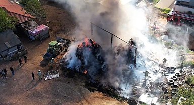 Arnavutköy'de ahırların yanına istiflenmiş saman balyaları alev alev yandı