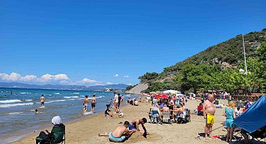 Güneşli hava sahillerini doldurdu