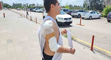 Hastaneye giderken kurt köpeğinin saldırısıyla yaralandı