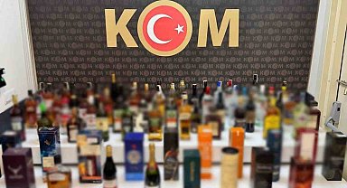 Polis kaçak alkollü içki ve mermi ele geçirdi