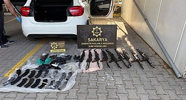 Polis memurunun kiraladığı otomobilden kaleşnikoflar çıktı
