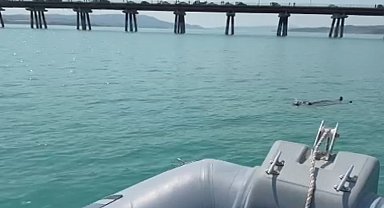 Adana'da baraj gölüne düşen kadını gemi adamlar kurtardı