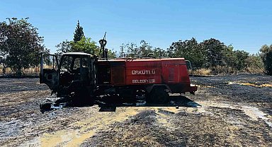 Arazi yangınında alevlerin arasında kalan itfaiye aracı yandı