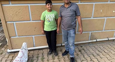 Balık ağıyla kuşu kurtardı