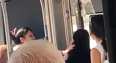 Çocuğuyla otobüse binen tesettürlü kadına hakaret eden saldırgan gözaltına alındı