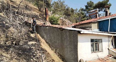 Otluk alanda çıkan yangın eve sıçramadan söndürüldü