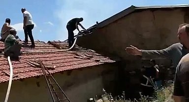 Şarkikaraağaç'ta bahçe temizliği sırasında çıkan yangında ahır ve samanlık yandı