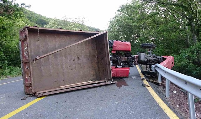Yan yatan traktörün altında kalan sürücü ağır yaralandı