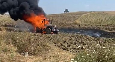 Yanan traktöre aldırmadı, çocuklarını teselli etti