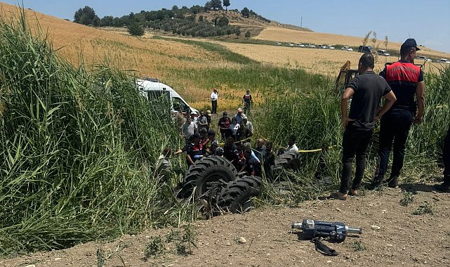 Yangını söndürmek isterken traktörün altında kaldı