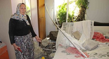 Amasya'da istinat duvarı evin üzerine çöktü