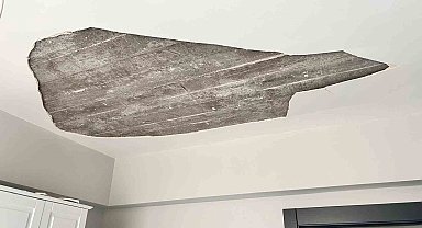 Ankara'da bebek, çöken tavan sıvasından saniyelerle kurtuldu