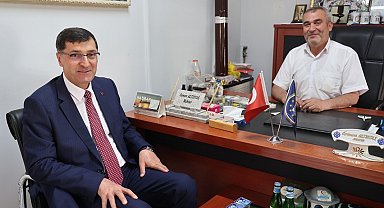 Başkan Eyüp Kahveci'den hacdan dönen muhtarlara ziyaret