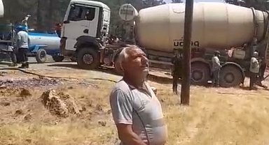 Beton pompası ile yangın söndürmeye katıldı