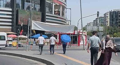Diyarbakır sıcağında şemsiyeli çözüm