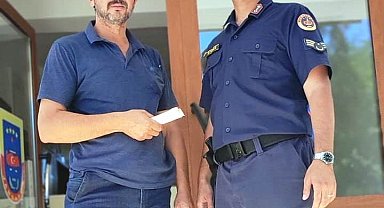 Jandarma, servis şoförünün bulduğu 5 bin lirayı sahibine teslim etti
