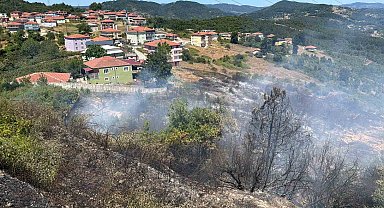 OSB içindeki ormanlık alanda çıkan yangın yürekleri ağza getirdi