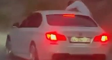 Trafikte camdan sarktı, sigara izmaritini yola attı