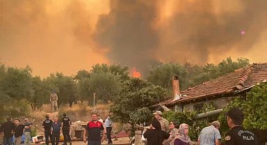 Alevlerin esir aldığı kırsal mahalle havadan görüntülendi