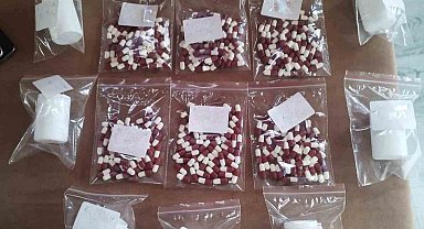 Cips paketinden uyuşturucu çıktı, silahlar ele geçirildi