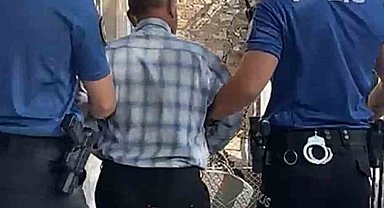 Dolandırıcılıktan 18 yıl hapisle aranıyordu, İzmir'de yakalandı