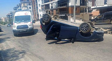 Manisa'da takla atan araçtan burnu bile kanamadan çıktı