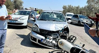 Otomobille çarpışan motosiklet sürücüsü yaralandı