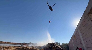 Yanan saman balyalarına jandarma helikopteriyle müdahale