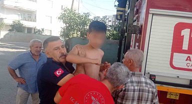 Yangında mahsur kalan yaşlı kadın ile çocuk kurtarıldı
