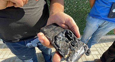 Akülerin üzerinde unutulan cep telefonu patladı